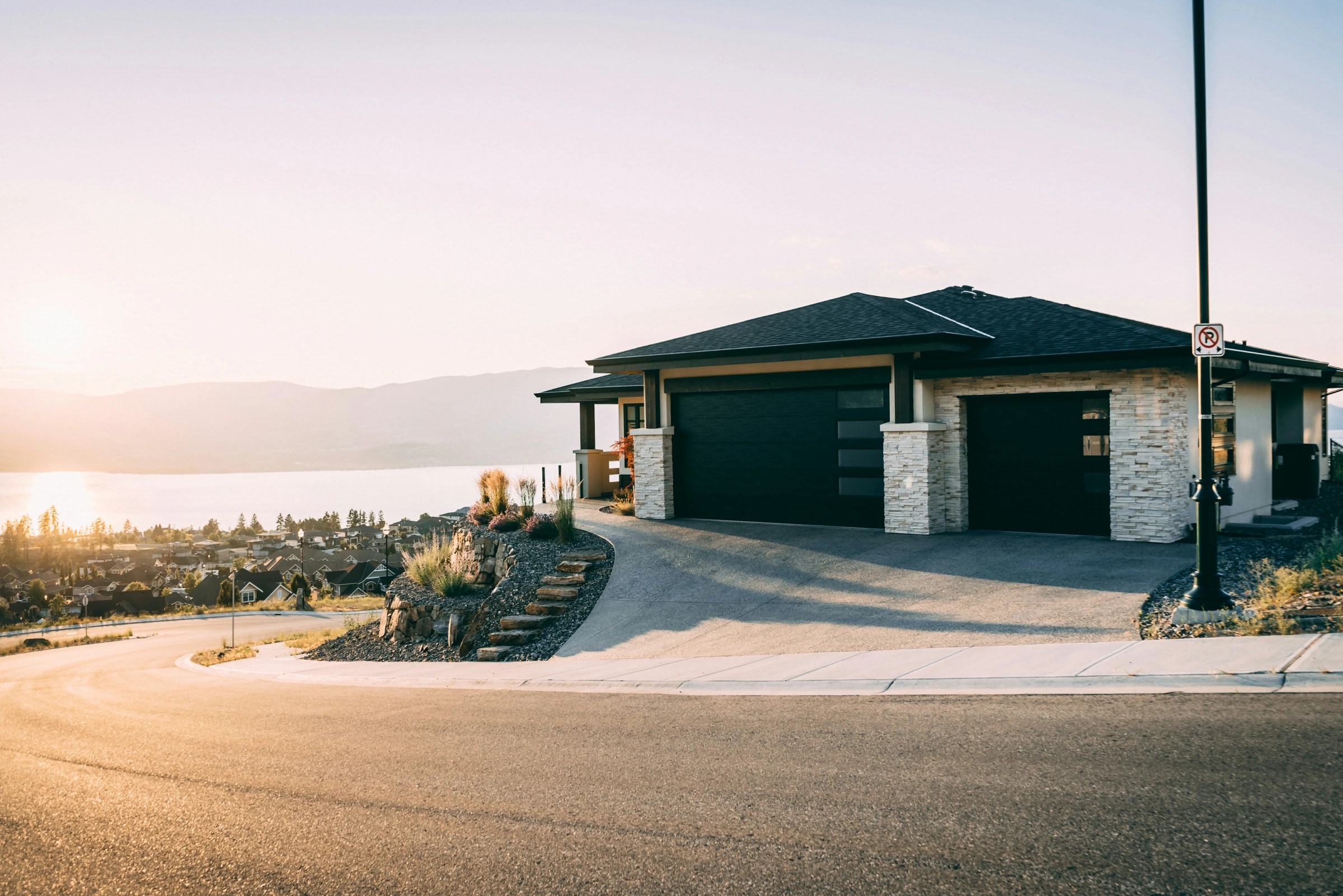 High-end home with two large modern garage doors